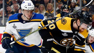 Next Story Image: Blues' Dunn, Bruins' Chara play through pain to join jaw-dropping club